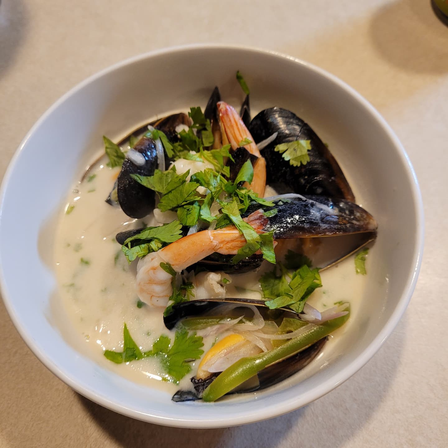 We made @gordongram 's mussels with coconut milk, chilis, and cilantro last night from the @hellskitchenfox cookbook with an added twist of shrimp. SO. GOOD. I couldn't slurp up enough of the broth!

#dinner #hellskitchen #cookbook #seafood #yummy #delish #nofilterneeded